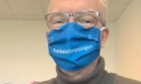 Psoriasisforeningen har fået fremstillet mundbind